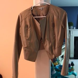 Cream color leather jacket.